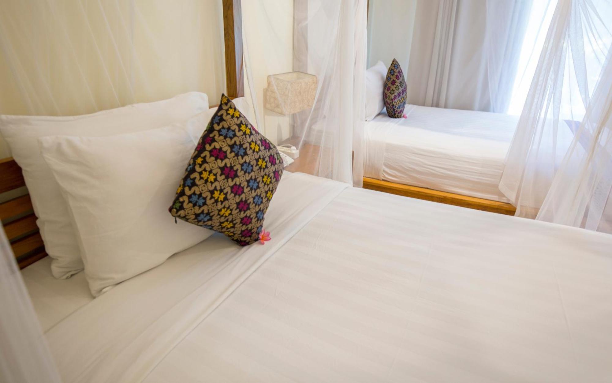 Puri Sari Beach Hotel Labuan Bajo Szoba fotó